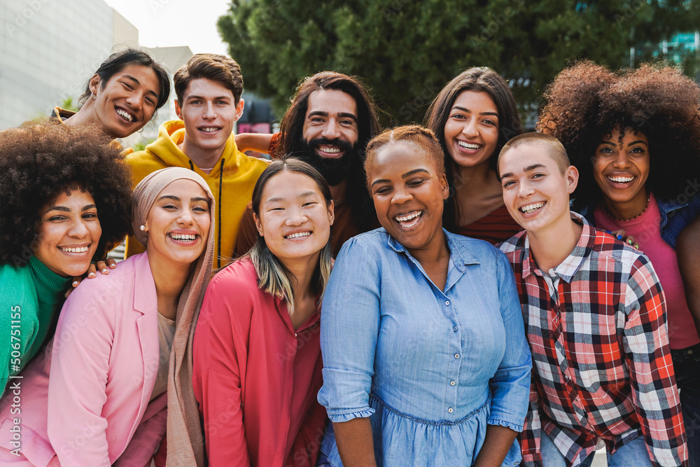 A Group Of People Standing Around Each Other In The Woods Looking At A A Group Of People Standing Around Each Other In The Woods Looking At A