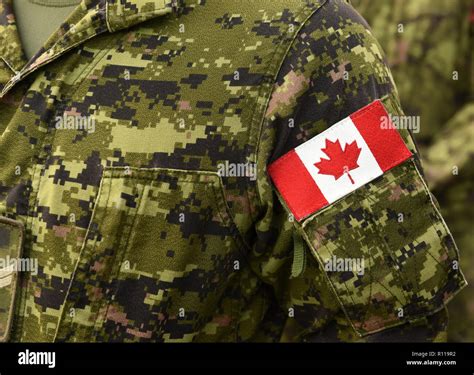 Canadian Troops Canadian Army Canada Flags On Soldiers Arm Stock Canadian Troops Canadian Army Canada Flags On Soldiers Arm Stock