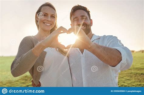 Couple Portrait And Heart Hand With Sun For Romantic Date On Beautiful Couple Portrait And Heart Hand With Sun For Romantic Date On Beautiful