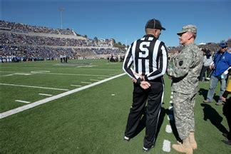 Gen Dempsey Talks With A Sideline Judge During The Army Versus Air Gen Dempsey Talks With A Sideline Judge During The Army Versus Air