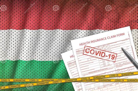 Hungary Flag And Health Insurance Claim Form With Covid 19 Stamp Hungary Flag And Health Insurance Claim Form With Covid 19 Stamp