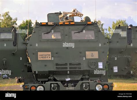 M142 High Mobility Artillery Rocket System Himars Firing Durin Hi Res M142 High Mobility Artillery Rocket System Himars Firing Durin Hi Res
