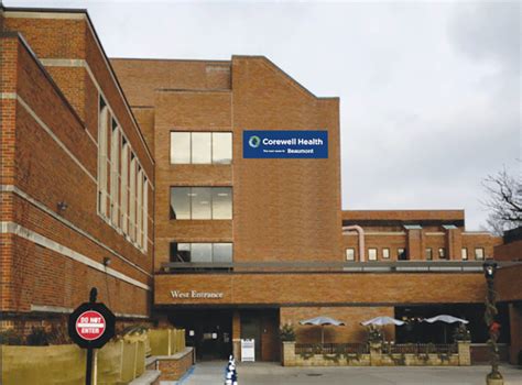 Sign Of The Times As Former Beaumont Gets Temporary Corewell Sign Sign Of The Times As Former Beaumont Gets Temporary Corewell Sign