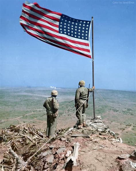 Two Us Marines Look Over Iwo Jima From Atop Mt Suribachi Where Just Two Us Marines Look Over Iwo Jima From Atop Mt Suribachi Where Just