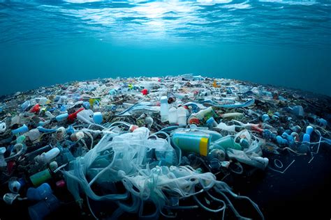 Underwater View Of Ocean Pollution With Plastic Waste And Discarded Underwater View Of Ocean Pollution With Plastic Waste And Discarded