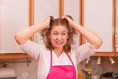Unhappy Housewife In Kitchen Stock Photo Image Of Face Pink 66859760 Unhappy Housewife In Kitchen Stock Photo Image Of Face Pink 66859760